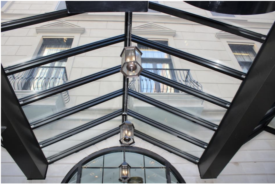 Overhead skylight with hanging lantern fixtures.